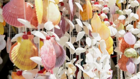 Moving shell wind chimes in the breeze Stock Footage 91017971