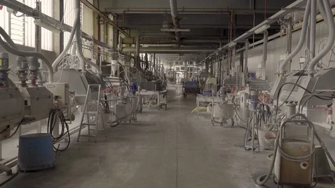 Moving shot along equipment of workshop in industrial plant, ceramic tile produc Stock Footage 128026081