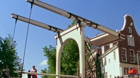 Moving shot from a boat going under European draw bridge, Super 8mm Film, HD Stock Footage 122112850