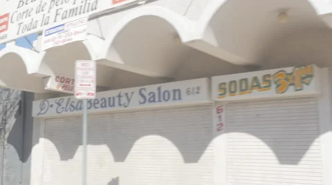 Moving Shot of Border Town Storefronts Stock Footage 60432494