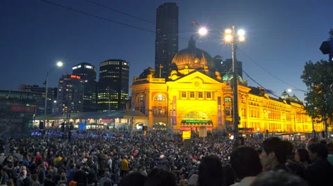 Moving shot of crowd in downtown Melbourne during White Night festival Video stock 61960780