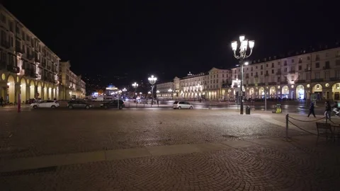 Moving shot of an empty and illuminated square at night Stock Footage 235398470