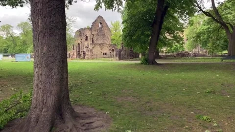 Moving shot of Kirkstall Abbey on a cloudy day in Leeds, UK. Stock Footage 131085756