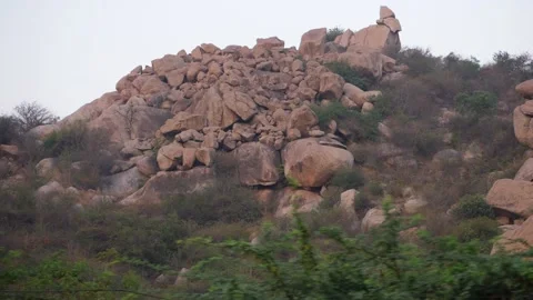 Moving shot of large mountain rocks, Brown color rocks on the mountain Stock Footage 151940141