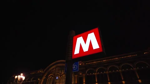 Moving shot of a red luminous subwey sign 스톡 동영상 235397918