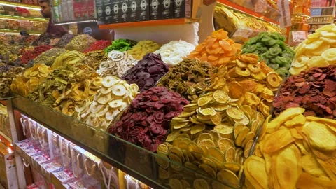 A moving shot showing various kinds of teas, dry fruits and spices at a bazaar Stock Footage 265485718