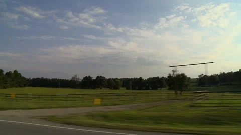 Moving shot while driving through rural Arkansas Stock Footage 41816565
