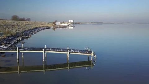 Moving side shot from pier Stock Footage 74870775