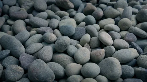Moving Sideways Past Beach Pebbles Stock Footage 90499556