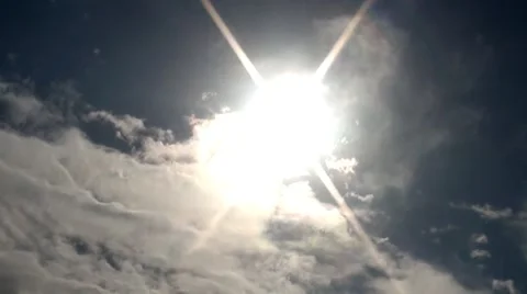 Moving on sky clouds are in the rays of a sun Stock Footage 42570740