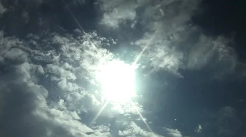 Moving on sky clouds are in the rays of a sun Stock Footage 42570744