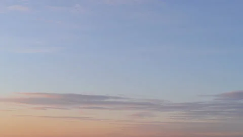 Moving soft clouds, colored in orange and purple pastel lights Stock-Footage 164987627