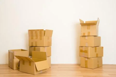 Moving in Stack of cardboard boxes 写真素材