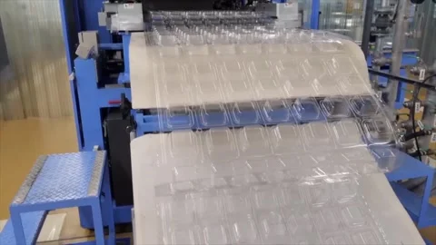 Moving stacked empty polypropylene box on conveyor belt in recycle factory. Stock Footage 288185188