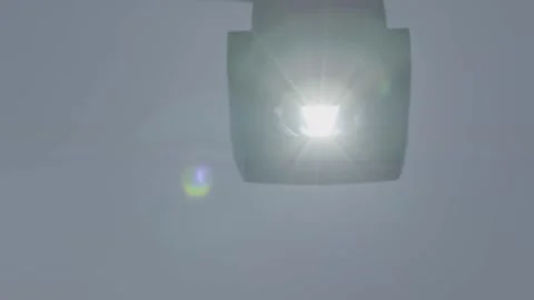Moving Stage Spotlight Projects Intense Beam Indoors at Event or Performance Ven Stock Footage 334053338