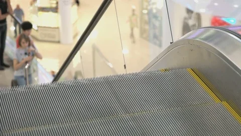 Moving staircase of escalator Stock Footage 76970743