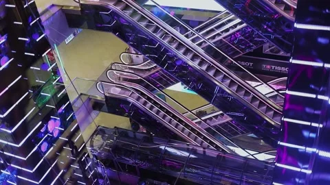 Moving staircases and elevator near empty cafe in Evropeiskiy trade center. Slow Stock Footage 276372400