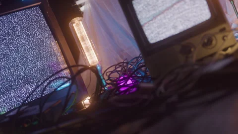 Moving Static Tv Screens with Cords Tangled on Floor Stock Footage 270386335