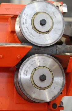 Moving stream of metal workpieces 스톡 사진