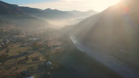 Moving Sun Rays Emerging Though The morning fog Clouds In The Mountains Stock Footage 205206292