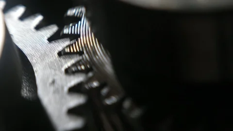Moving teeth of two broad cogwheels working in a modern car transmission Stock-Footage 124459695