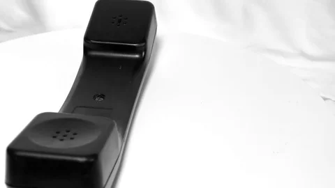 Moving telephone on white surface for concept Stock Footage 111887667