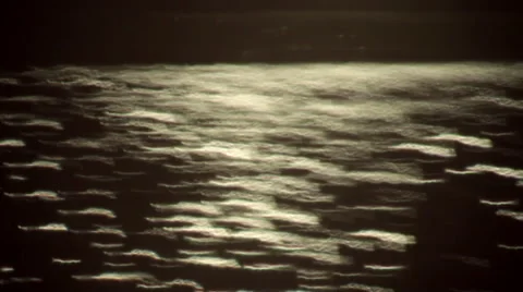 Moving texture of unusual sparkles on dark water background. Видео 47221532