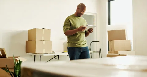 Moving, thinking and man with tablet in new house, interior design inspiration Stock Footage 336775908