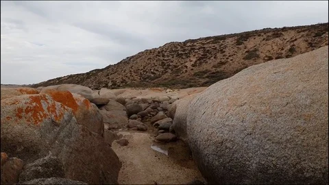 Moving through boulders Stock Footage 101044122