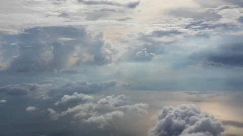 Moving through a cloudscape over the ocean, moving through clouds Stock Footage 120553465