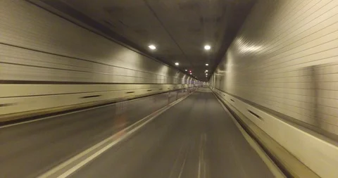 Moving through Empty Brooklyn-Battery Tunnel with Ceiling Lights 4K Stock Footage 113756412
