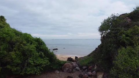 MOVING THROUGH GAP BETWEEN TWO BEACHES Stock Footage 221302280