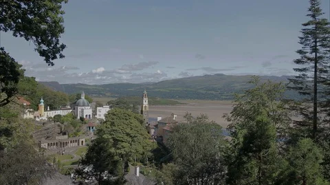 Moving through the hilltop trees and pillars overlooking a my Stock-Footage 128503180