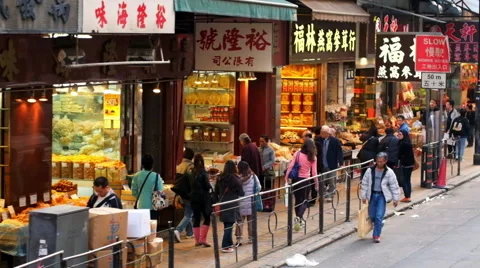 Moving through modern city crowded street. Hong Kong Video stock 59800619