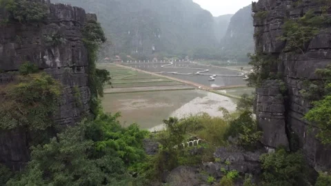 Moving Through Mountain to Rice Paddy Stock Footage 255029998