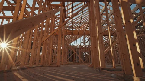 Moving through a new home construction with framing. Vídeos de archivo 137334349