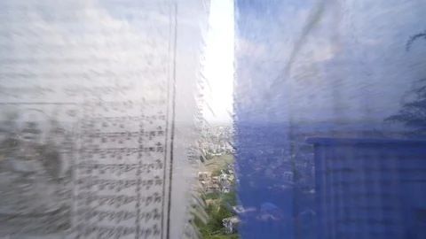 Moving through prayer flags in Nepal to reveal Kathmandu from high point Stock Footage 91135967