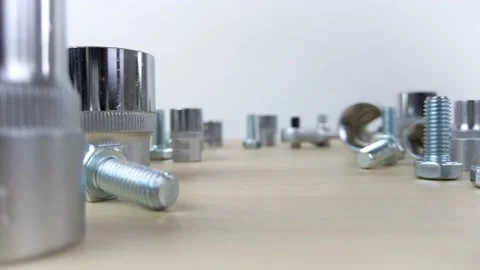 Moving through ratcheting socket wrench sockets and bolts Stock Footage 135358192