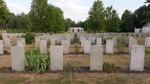 Moving Through Rows of Headstones and Monument at Cemetery, UK Stock Footage 341316959