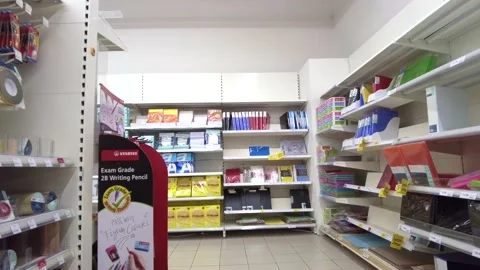 Moving through Tesco Lotus store, stationery section. Footage may contain noise  Stock Footage 150199693