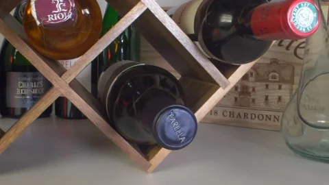 Moving through a wine bottle rack Stock Footage 132024437