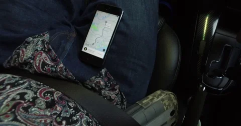 Moving tilt up pov of passenger inside uber Stock Footage 71360833