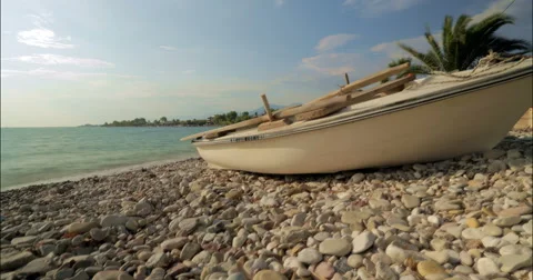 Moving time lapse with a boat and holiday resort 4K Stock Footage 49152631