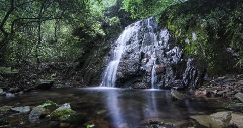 Moving Time Lapse of Small Stone Waterfall Landscape Video stock 319926183