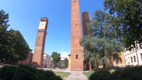 Moving time lapse walking towards the three medieval towers of Pavia Video stock 137289362