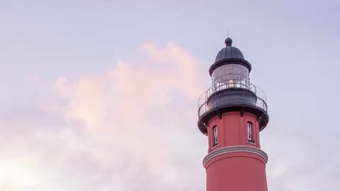Moving timelapse of clouds and sunset on Daytona Beach Lighthouse Stock Footage 70673764