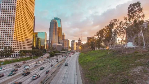 Moving timelapse (hyperlapse) at twilight day to night with traffic in LA Video stock 77490171