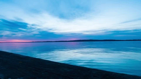 Moving timelapse a sunrise on a bay Video stock 75334917