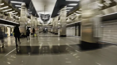 Moving together with passengers on the platform and escalators of the metro,  Stock Footage 167909030