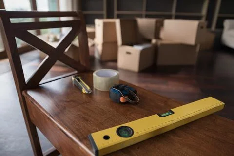 Moving tools set, instruments for unpacking and furnishing house Stock Photos